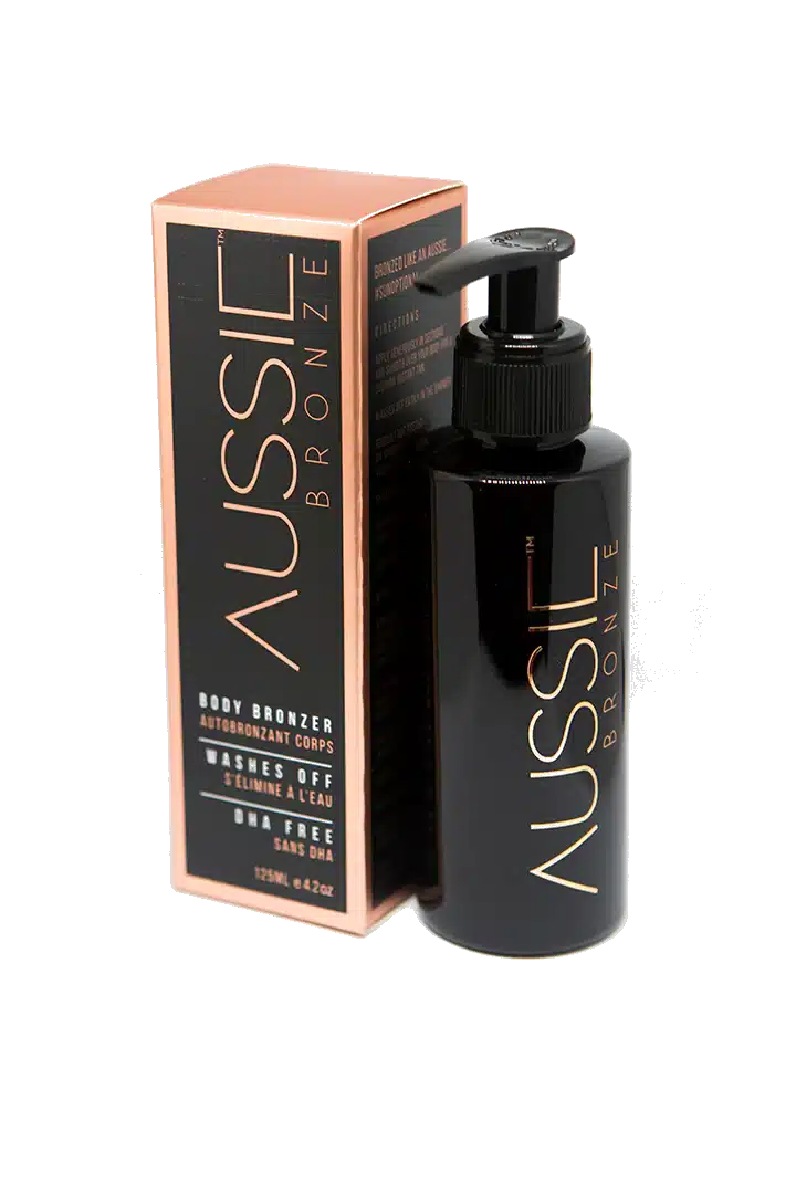 En flaske Aussie Bronze - Instant tanning 125ml bodylotion ved siden af en æske, der fremmer helbred og velvære.