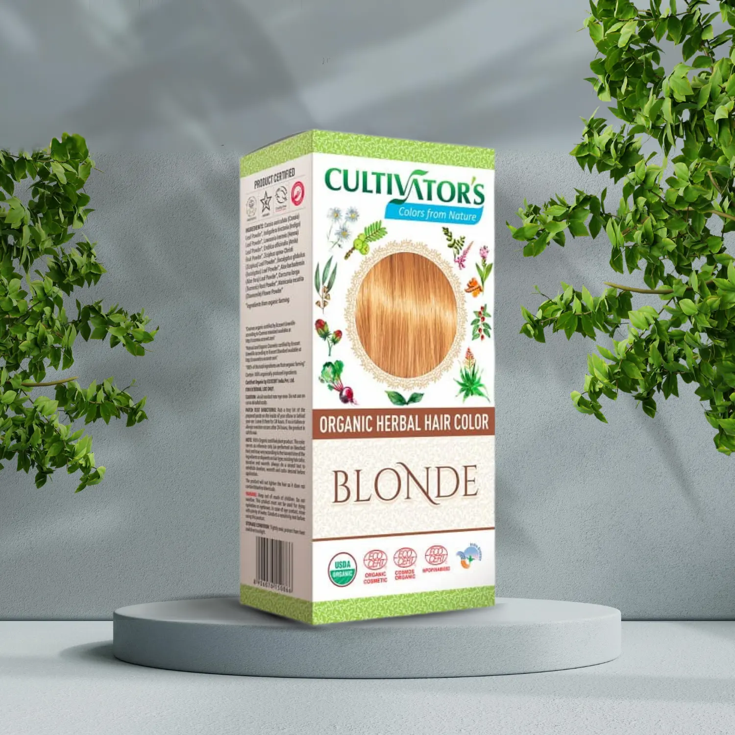 Æsken med Cultivators Henna hårfarve Blonde 100g står på et bord ved siden af et træ og spreder en følelse af velvære og sundhed.