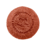 En naturlig rød sæbe med Krops sæbe bar og shampoo bar sæt logo på.