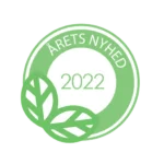 Pureday Grønt og hvidt cirkulært badge med teksten "Skoon shampoo bar - Volume & Strength VINDER I 2022" med et bladdesign fra Matas, der symboliserer en pris eller anerkendelse for en ny udvikling i 2022.