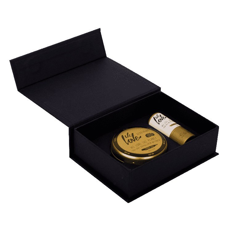 En naturlig sort æske indeholdende en Økologisk Deodorant Creme og læbepomade - Golden version - Limited Edition tube læbepomade.